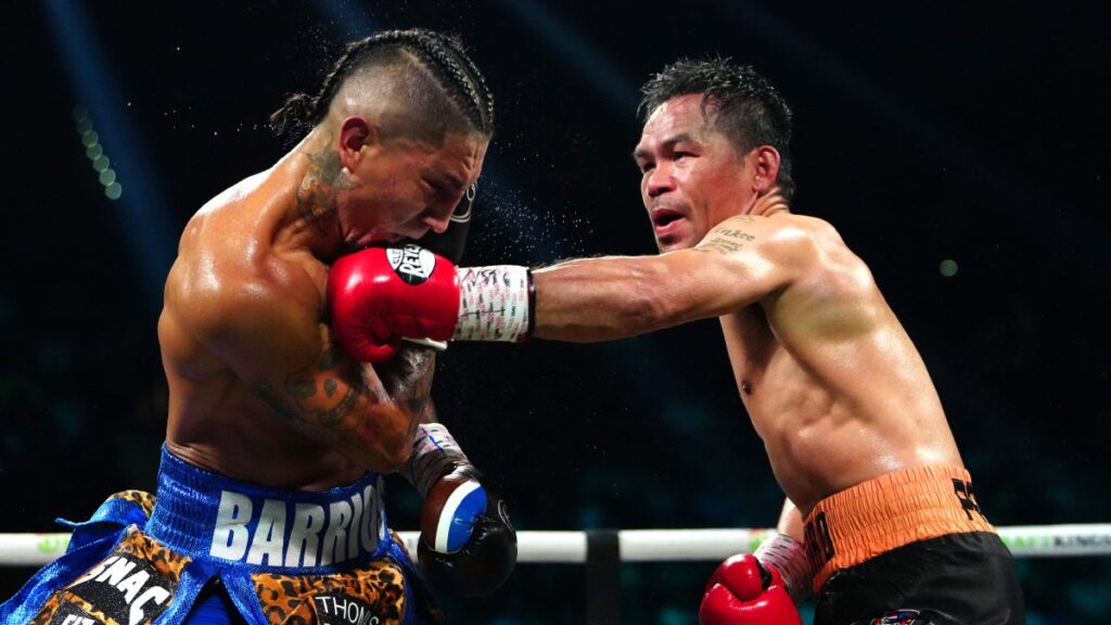 Pacquiao dándole un golpe a Mario Barrios