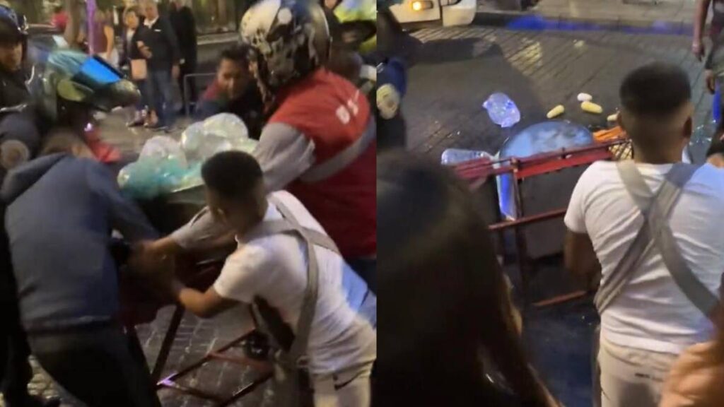 POLICIAS TIRAN PUESTO DE ELOTES A COMERCIANTES
